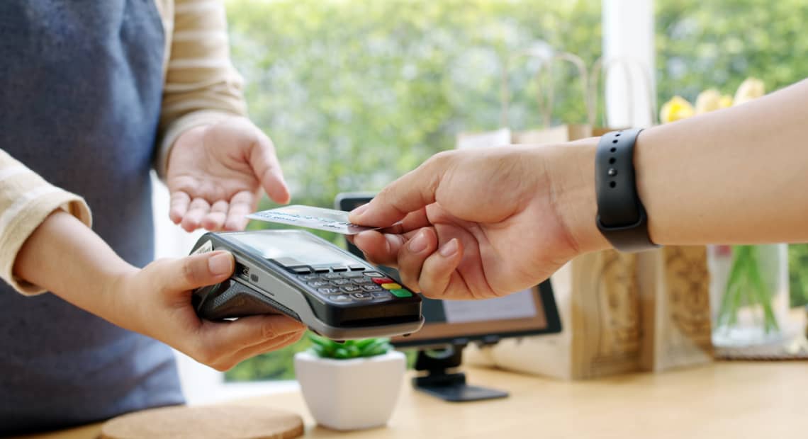 Tap to pay with NETS with your <br/>UOB One Debit Visa Card or <br/>ATM Contactless Card