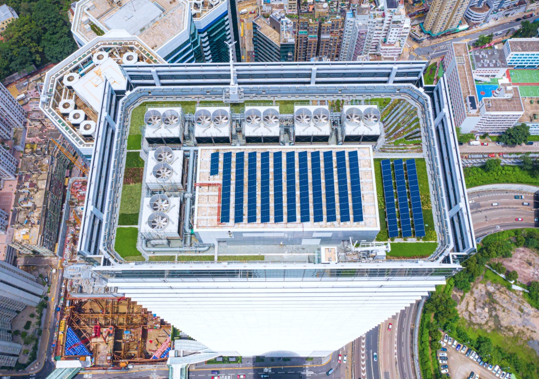 Building rooftop with solar panels - U-Energy